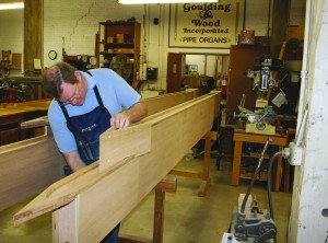 Cabinetmaker Rob Heighway constructing columns for the facade.