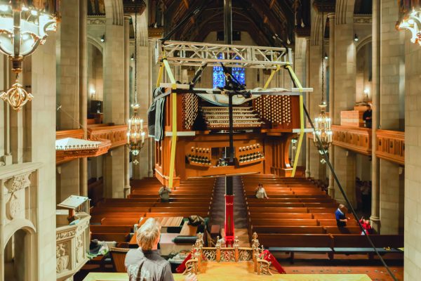 Opus 71's five-manual console being hoisted into the choir loft (photo Michael Monar Photography)